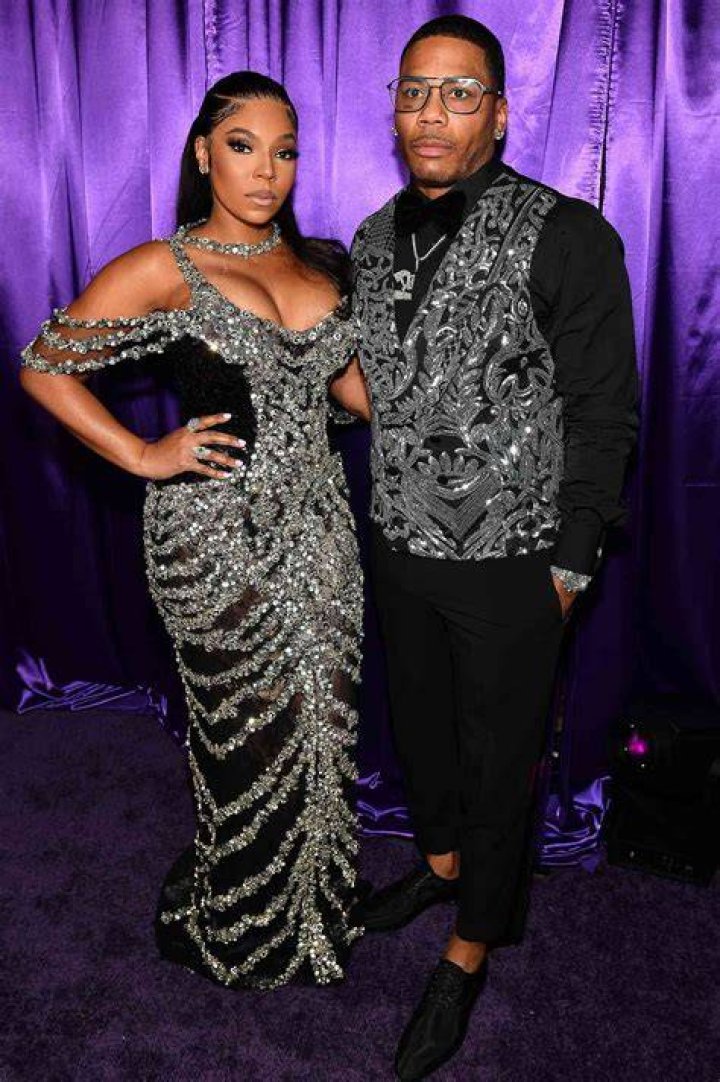 Ashanti Carries Purse with Her and Nelly's Faces on It at 2023 MTV VMAs
