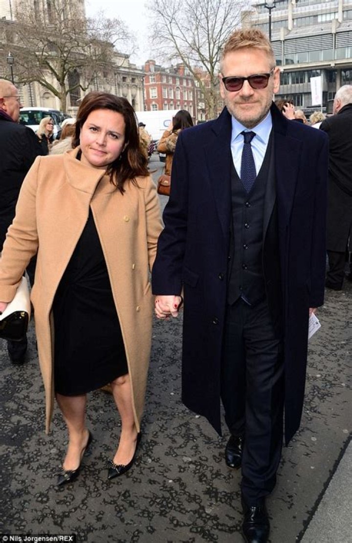 Branagh cosies up to wife Lindsay Brunnock at the London