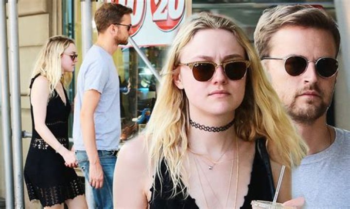 Dakota Fanning looks upset during with boyfriend Jamie Strachan in NYC