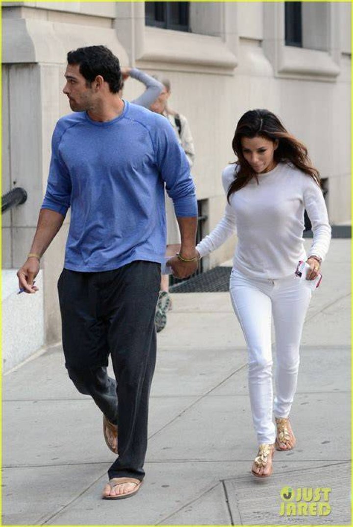 Eva Longoria and Mark Sanchez hold hands during first public appearance