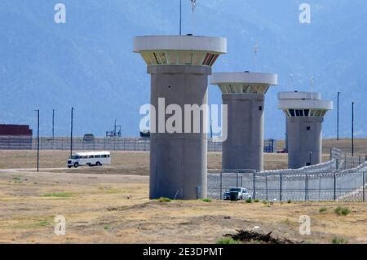 Guard towers surround the federal penitentiary facility known as