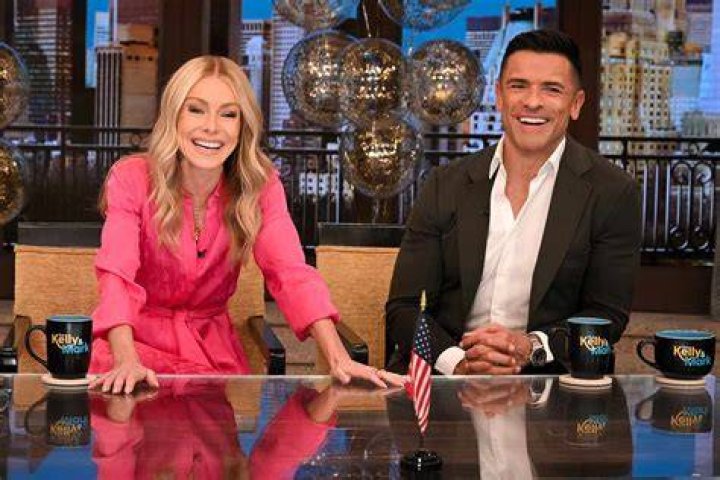 Live host Mark Consuelos shows off his massive muscles in tight gym