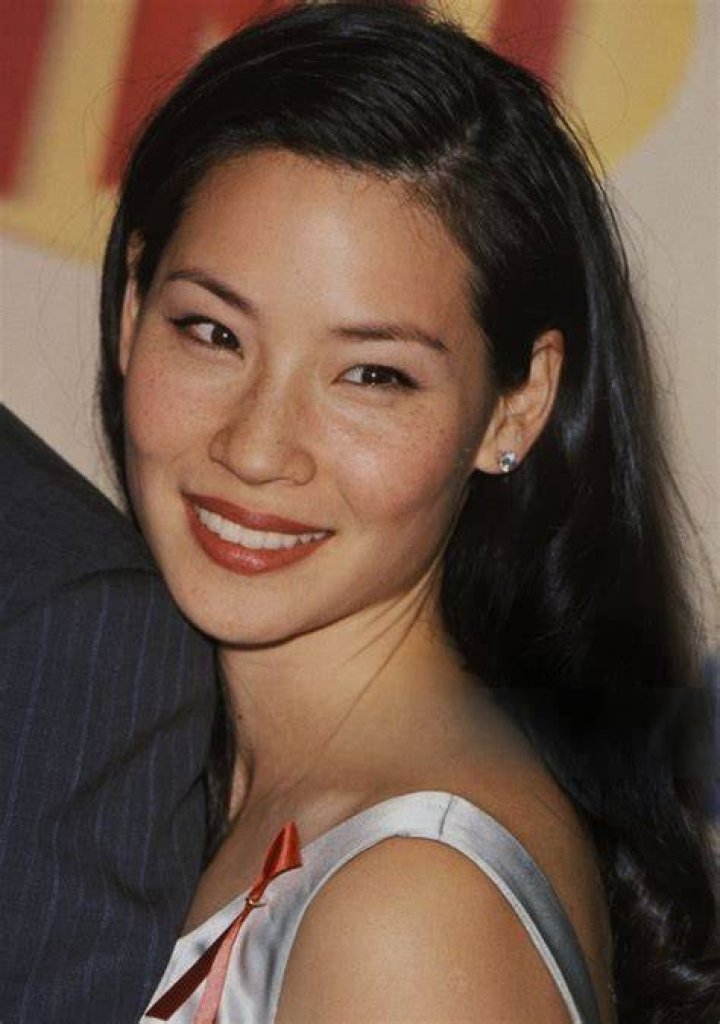 Lucy Liu strolls handinhand with mystery man as pair enjoy a spot of