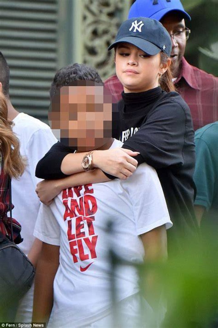 Selena Gomez hugs her grandfather as she enjoys family trip to